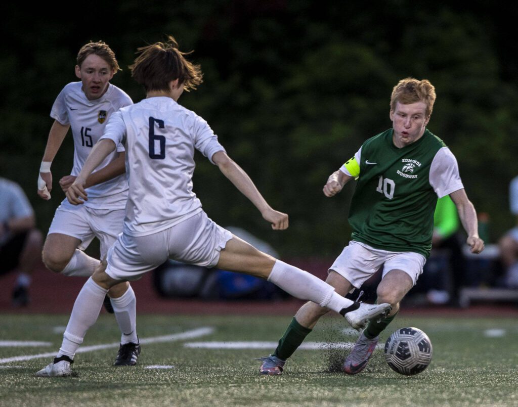 Edmonds-Woodway’s Ben Hanson (10) moves with the ball during a game between Edmonds-Woodway and Mead at Edmonds-Wooday High School in Edmonds, Washington on Friday, May 19, 2023. Edmonds-Woodway won, 2-0. (Annie Barker / The Herald)
Edmonds-Woodway’s Ben Hanson (10) moves with the ball during a game between Edmonds-Woodway and Mead at Edmonds-Wooday High School in Edmonds, Washington on Friday, May 19, 2023. Edmonds-Woodway won, 2-0. (Annie Barker / The Herald)
