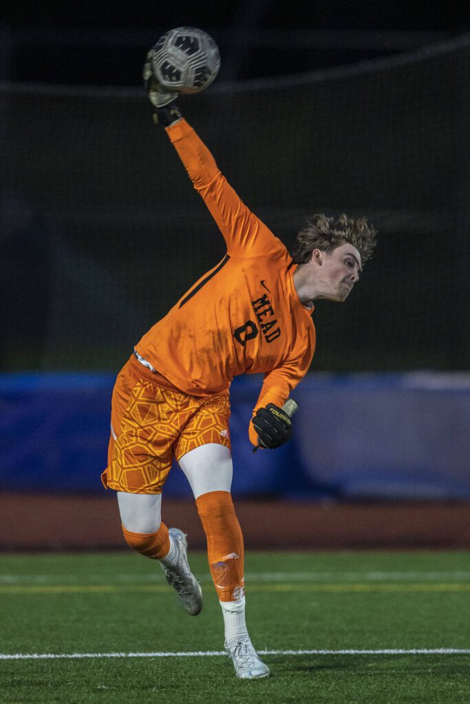 A Mead goalkeeper lobs the ball during a game between Edmonds-Woodway and Mead at Edmonds-Wooday High School in Edmonds, Washington on Friday, May 19, 2023. Edmonds-Woodway won, 2-0. (Annie Barker / The Herald)
