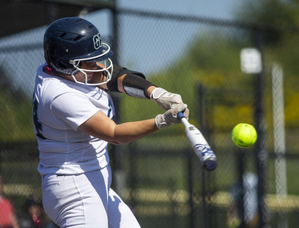 Glaicer Peak’s Katelyn McCallum hits the ball during the game against Eastlake on Friday, May 19, 2023 in Everett, Washington. (Olivia Vanni / The Herald)
