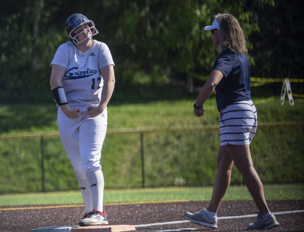 Glacier Peak’s Briannica Titus celebrates her hit during the game against Eastlake on Friday, May 19, 2023 in Everett, Washington. (Olivia Vanni / The Herald)
