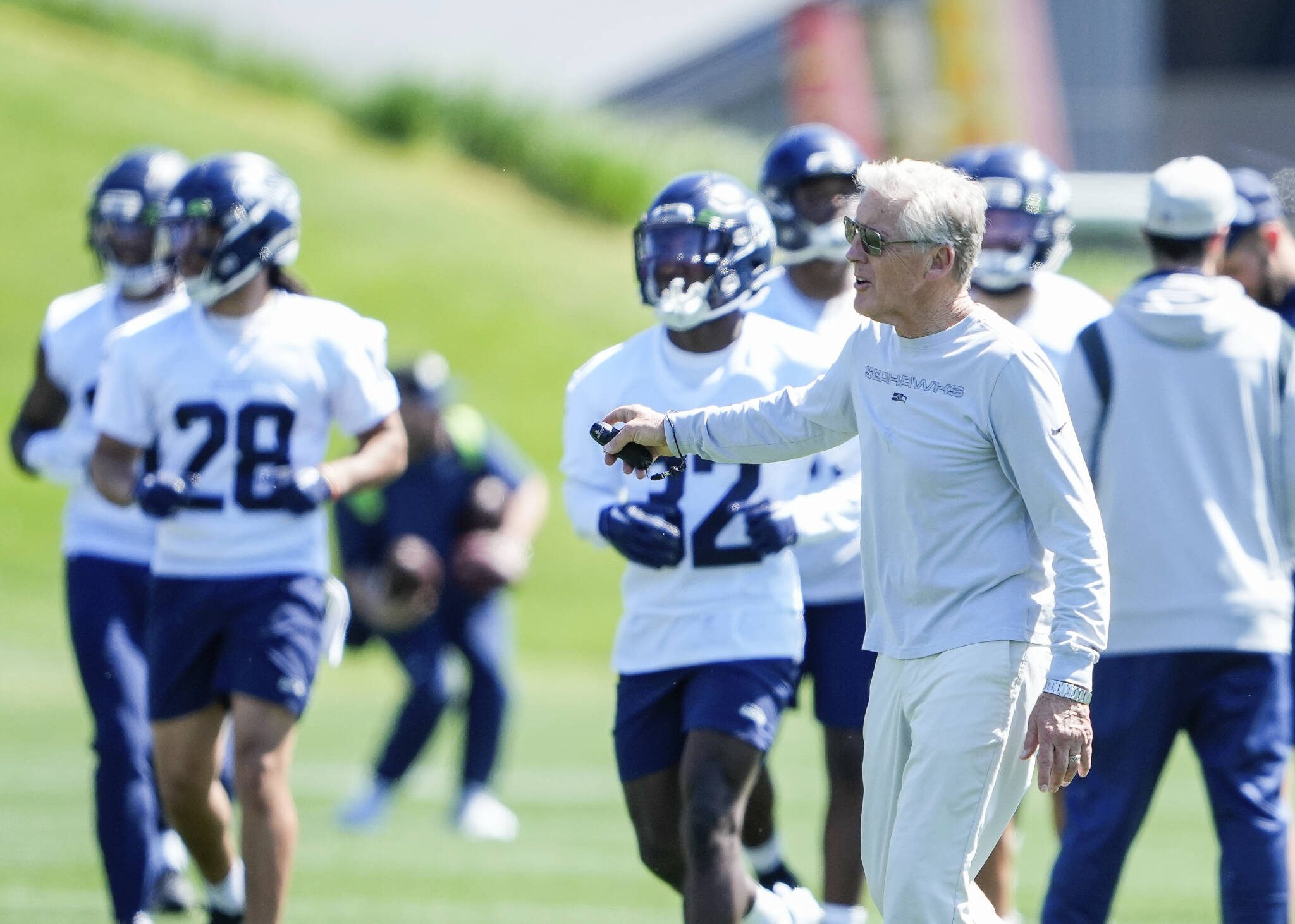 Seahawks head coach Pete Carroll directs players during the team’s rookie minicamp on May 12 n Renton. (AP Photo/Lindsey Wasson)