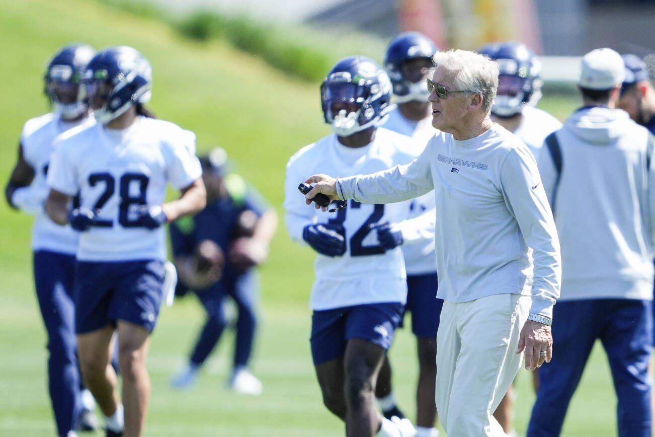 Seattle Seahawks head coach Pete Carroll directs players during the NFL football team's rookie minicamp, Friday, May 12, 2023, in Renton, Wash. (AP Photo/Lindsey Wasson)