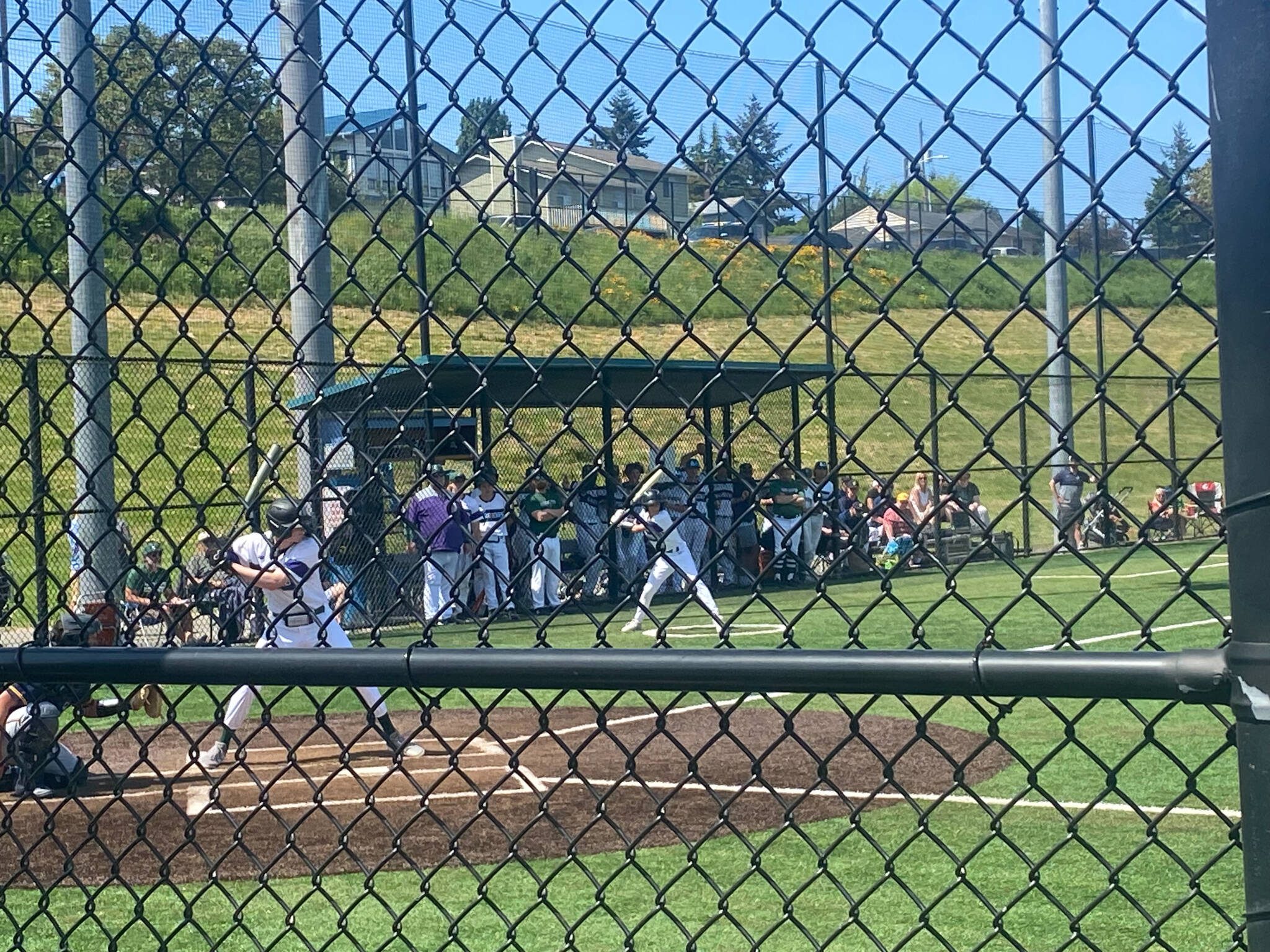 An Edmonds-Woodway hitter bats during a 3A state second-round game against Southridge on Saturday at the Southwest Athletic Complex in Seattle. (Evan Wiederspohn / The Herald)