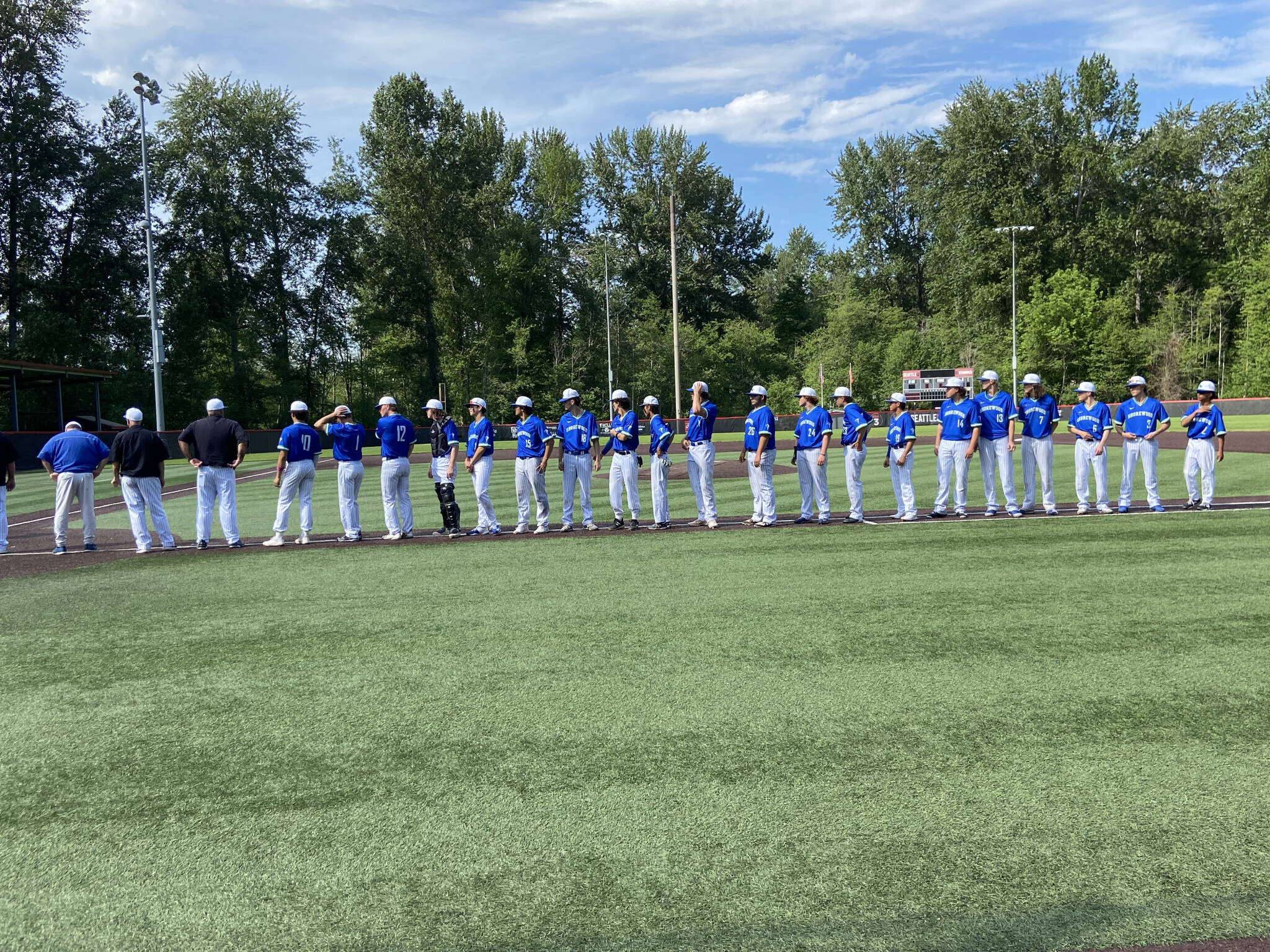 Shorewood players line up before the start of a state baseball game against Timberline on Saturday, May 20, 2023 at Bannerwood Park in Bellevue. (Zac Hereth / The Herald)