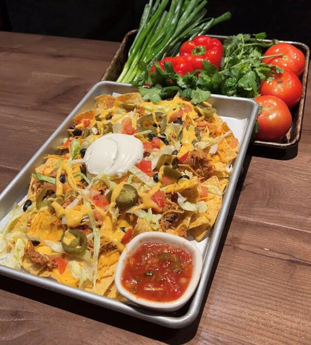 Smoked pork shoulder is the star of this tray of nachos. (Quil Ceda Creek Casino)