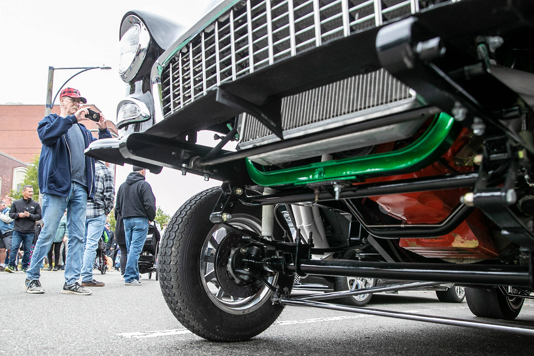 Thousands walk the streets of downtown Everett with cameras in hand at Cruzin’ to Colby in Everett in 2022. (Kevin Clark / The Herald)