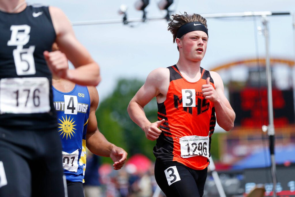 Monroe sophomore Mason Davis puts on the breaks after finishing 7th in the boys 3A 100 meter dash during the WIAA State Track and Field Championships on Saturday, May 27, 2023, at Mount Tahoma High School in Tacoma, Washington. (Ryan Berry / The Herald)

