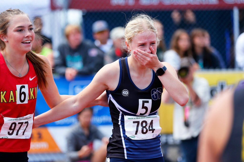 Jana Willems of Kamiak reacts to an unexpected victory in the 4A girls 100 meter dash during the WIAA State Track and Field Championships on Saturday, May 27, 2023, at Mount Tahoma High School in Tacoma, Washington. (Ryan Berry / The Herald)
