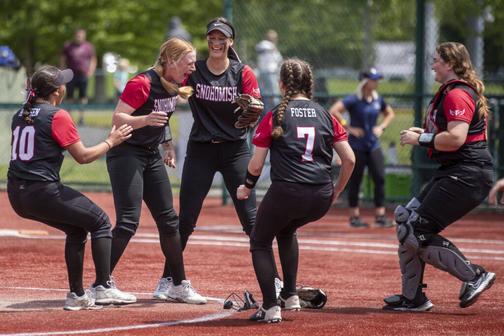 Snohomish players celebrate during a game between Snohomish and Walla Walla at the Lacey-Thurston County Regional Athletic Complex in Olympia, Washington on Saturday, May 27, 2023. Snohomish won, 7-3. (Annie Barker / The Herald)
