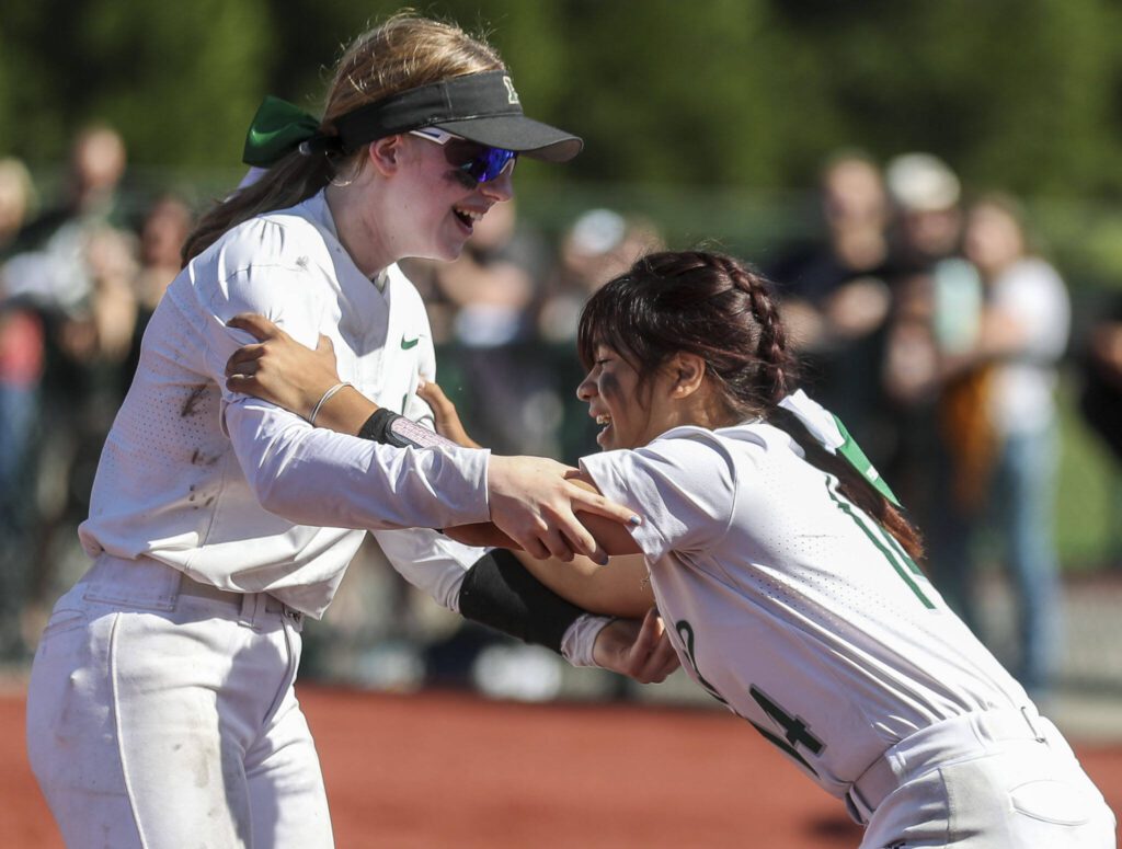 Peninsula players celebrate during the 3A softball championship game between Snohomish and Peninsula at the Lacey-Thurston County Regional Athletic Complex in Olympia, Washington on Saturday, May 27, 2023. Snohomish lost, 4-1. (Annie Barker / The Herald)
