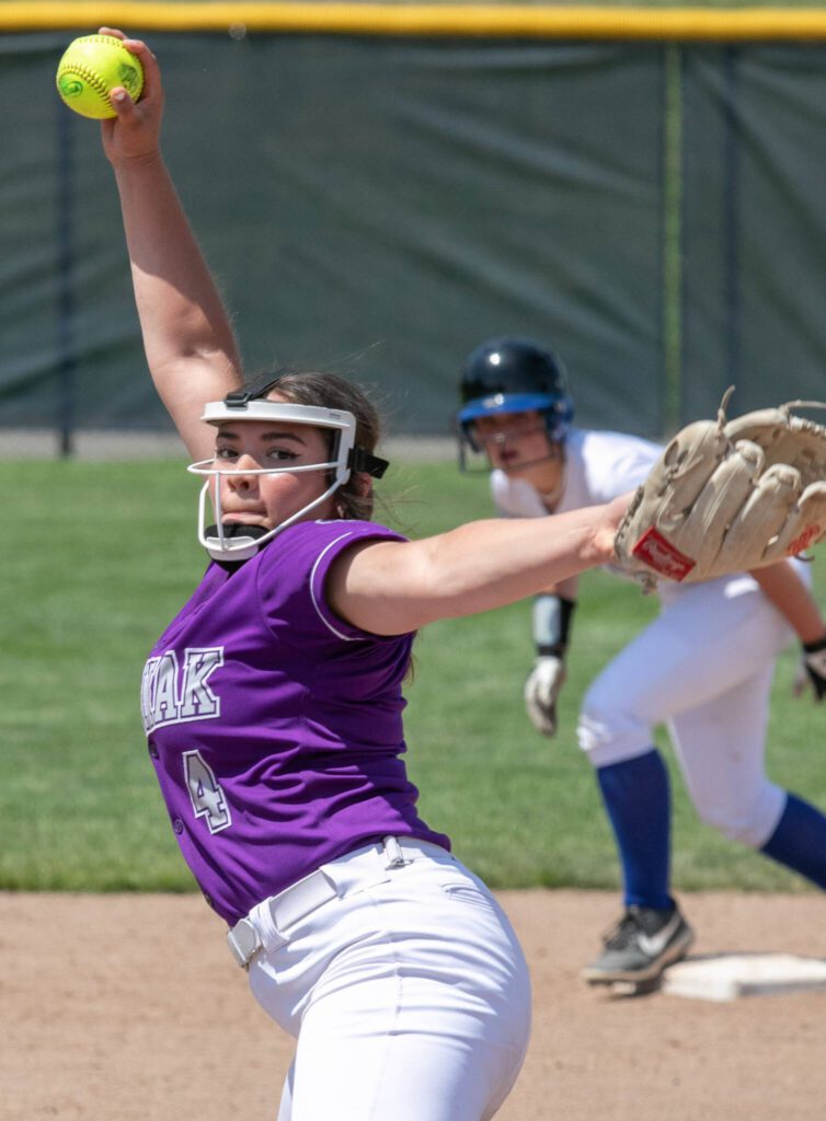 Kamiak’s Ally Boulger (4) pitches in the fifth inning during a 4A state softball consolation game against Bothell on Saturday in Richland. (TJ Mullinax / For The Herald)
