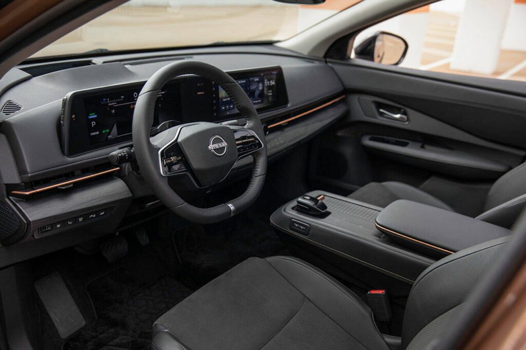 The well-made 2023 Nissan Ariya interior has a clean design with minimal physical controls. Most operations are done via touchscreen. (Nissan)
