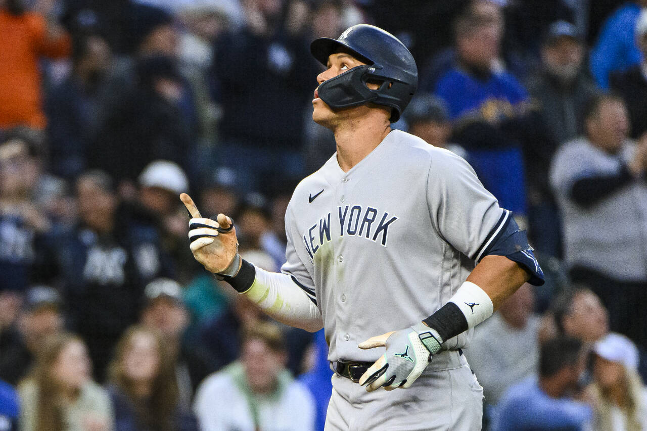 New York Yankees’ Aaron Judge gestures after hitting a solo home-run against the Seattle Mariners during the seventh inning of a baseball game Tuesday, May 30, 2023, in Seattle. (AP Photo/Caean Couto)