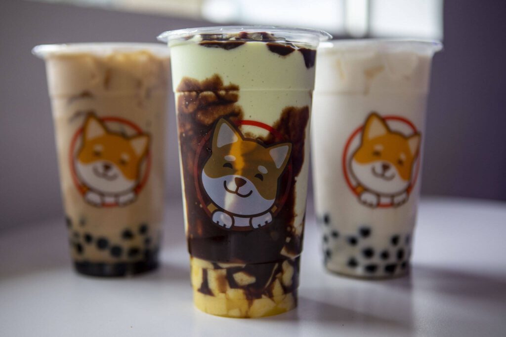 Left to right, wintermelon milk tea, an avocado shake with chocolate and Hokkaido tea at Pochi Bubble Tea Cafe in Lynnwood, Washington on Tuesday, May 30, 2023. (Annie Barker / The Herald)
