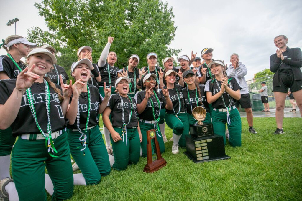The Jackson softball team is awarded the 2023 Class 4A state championship trophy May 27 in Richland. The Jackson softball team won its third state title since 2018. (TJ Mullinax/for The Herald)
