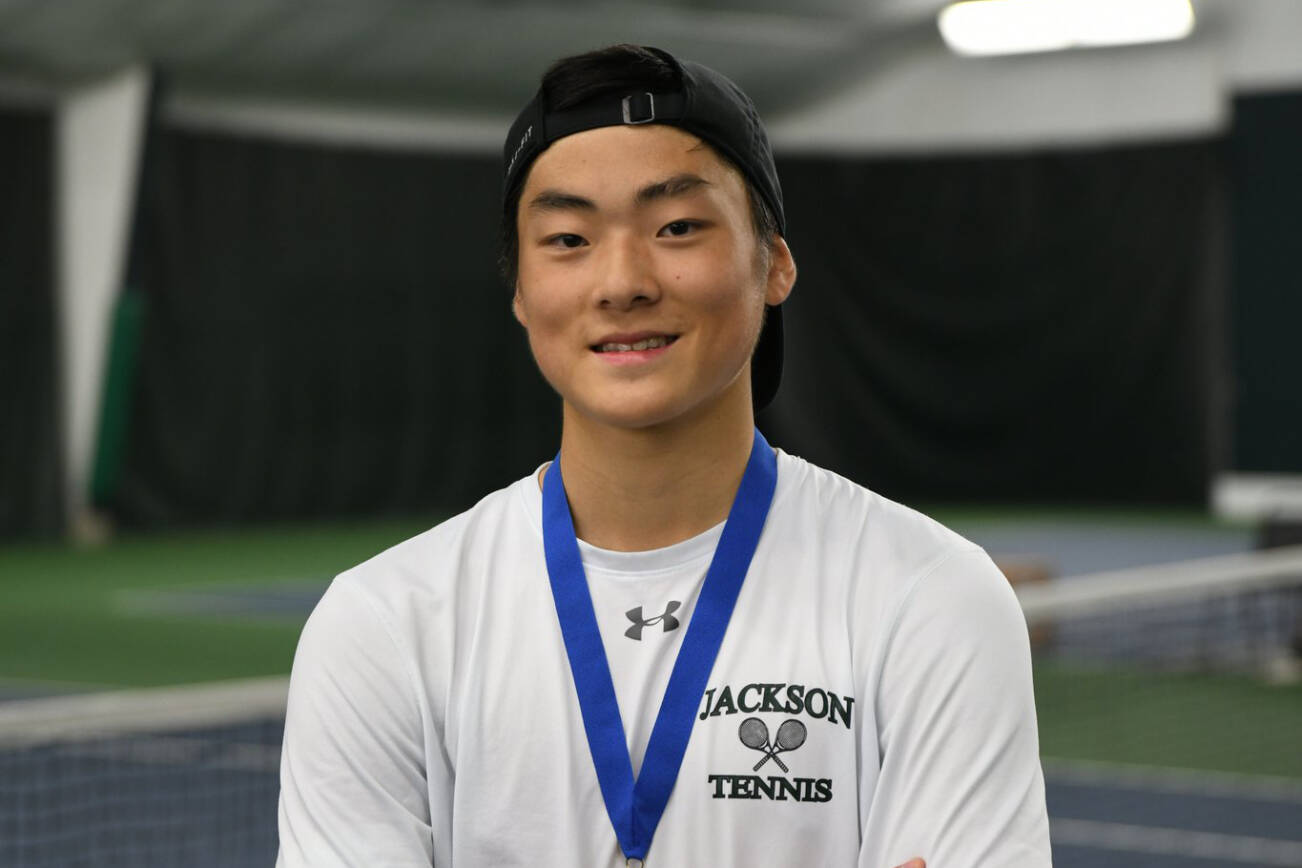 Jackson's Ben Lee poses with his first-place medal after winning the 4A boys singles state tennis tournament on May 27, 2023, in Kennewick. (WIAA photo)
