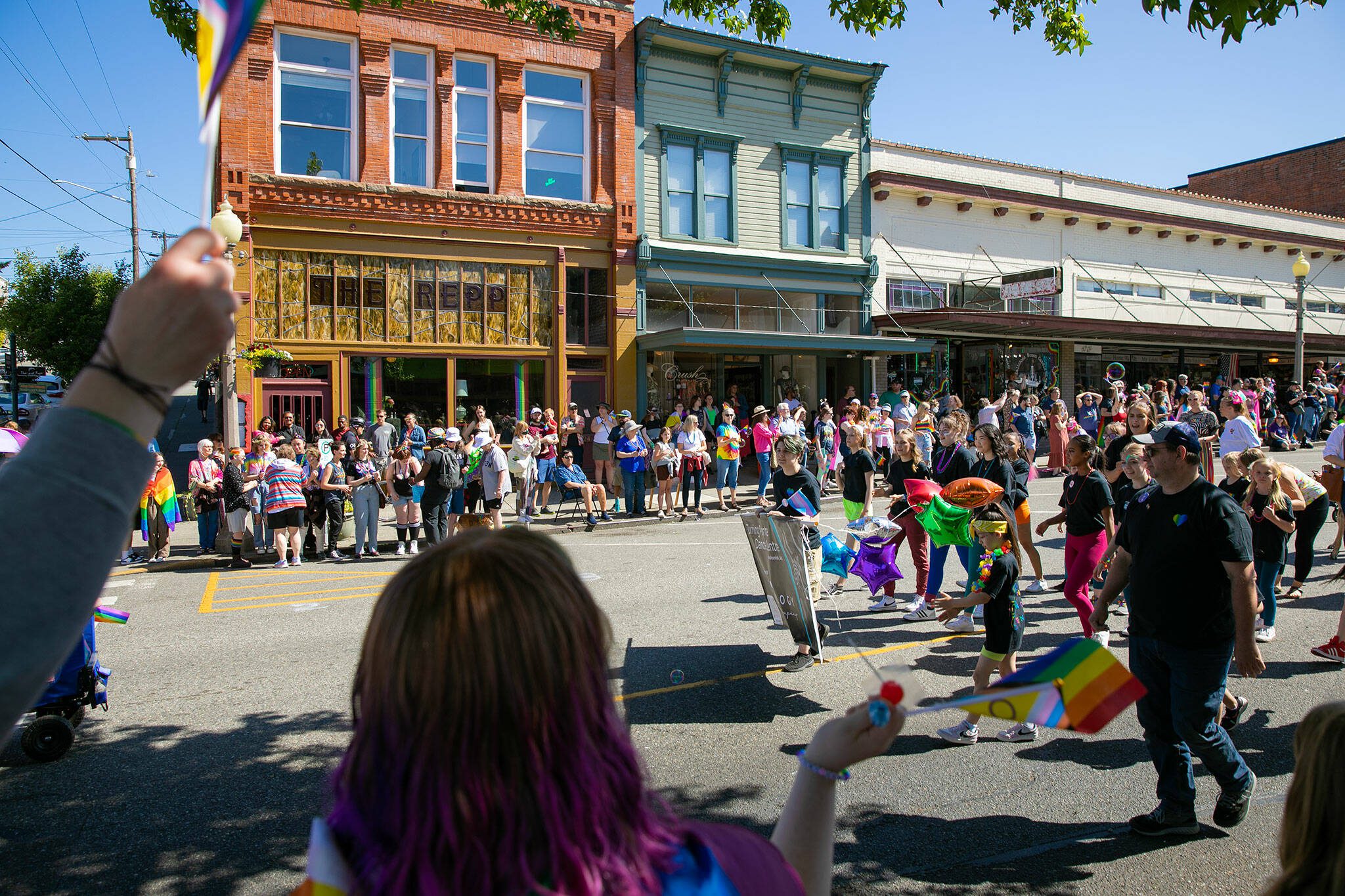 Hundreds line the streets during Snohomish’s inaugural Pride celebration on Saturday, June 3, 2023, in downtown Snohomish, Washington. (Ryan Berry / The Herald)
