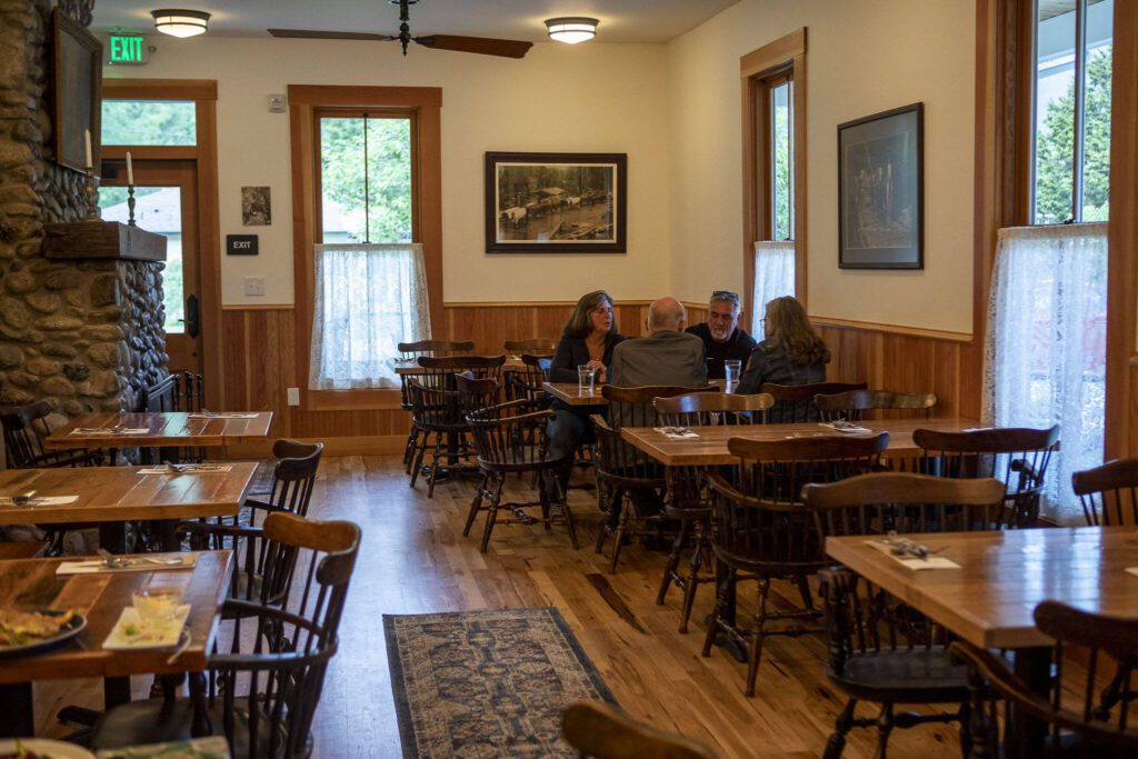 A dining area inside the Bush House Inn in Index, Washington on Monday, June 26, 2023. (Annie Barker / The Herald)
