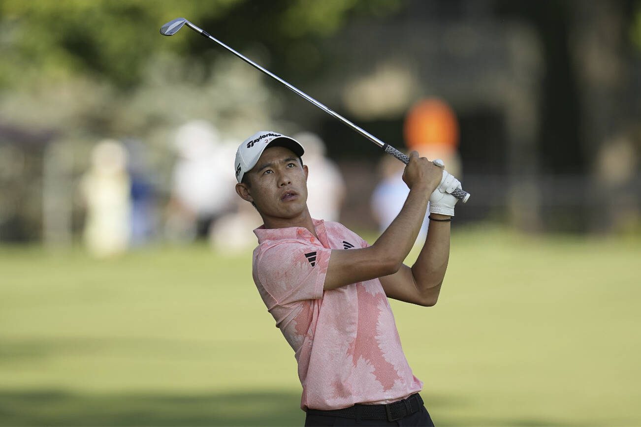 Collin Morikawa, hits to the 13th green during the first round of the Memorial golf tournament, Thursday, June 1, 2023, in Dublin, Ohio. (AP Photo/Darron Cummings)