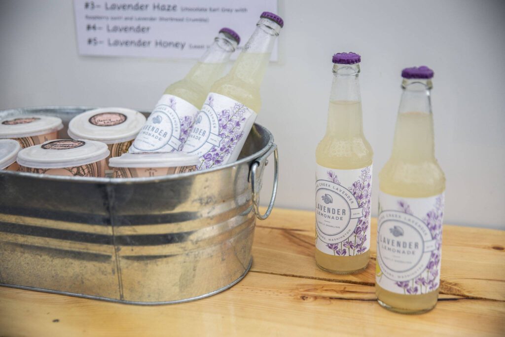 Spring Creek Lavender sells lavender lemonade at the Marysville Farmers Market on Friday, June 9, 2023, in Marysville, Washington. (Olivia Vanni / The Herald)
