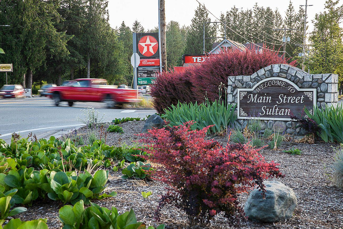 A truck pulls out onto US-2 from Main Street on Thursday, June 15, 2023 in Sultan, Washington. (Olivia Vanni / The Herald)