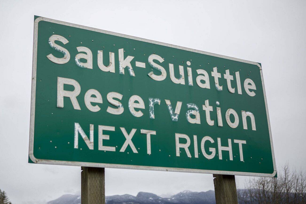 A sign near the Sauk-Suiattle Reservation in Darrington, Washington, on Thursday, March 23, 2023. (Annie Barker / The Herald)