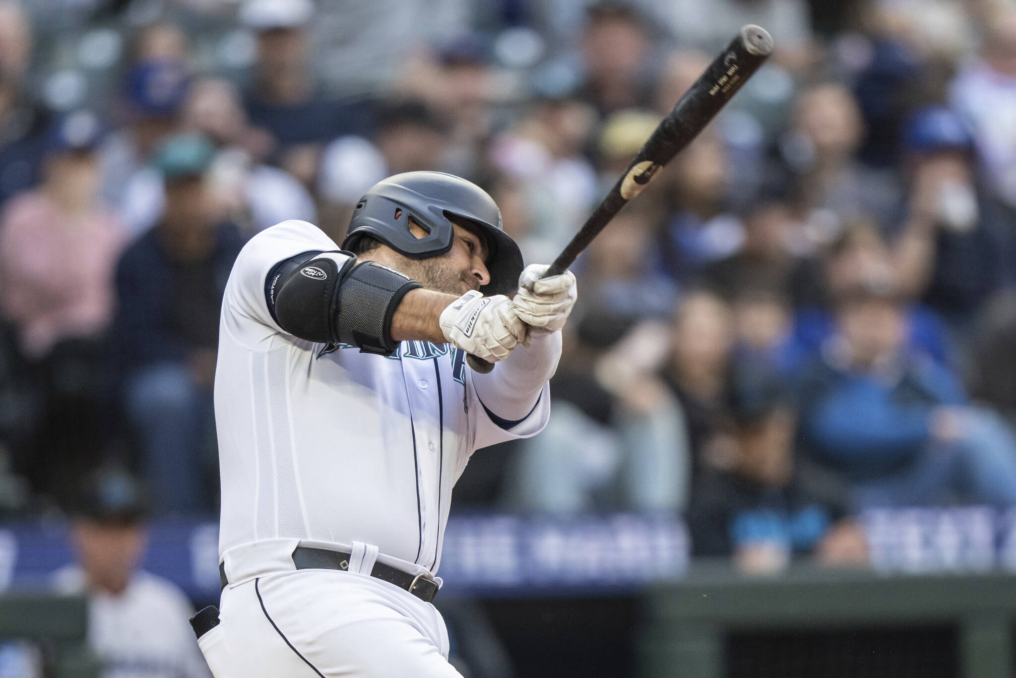 The Mariners’ Mike Ford hits a two-run home run off Marlins starting pitcher Edward Cabrera during the fourth inning of a game Tuesday in Seattle. (AP Photo/Stephen Brashear)