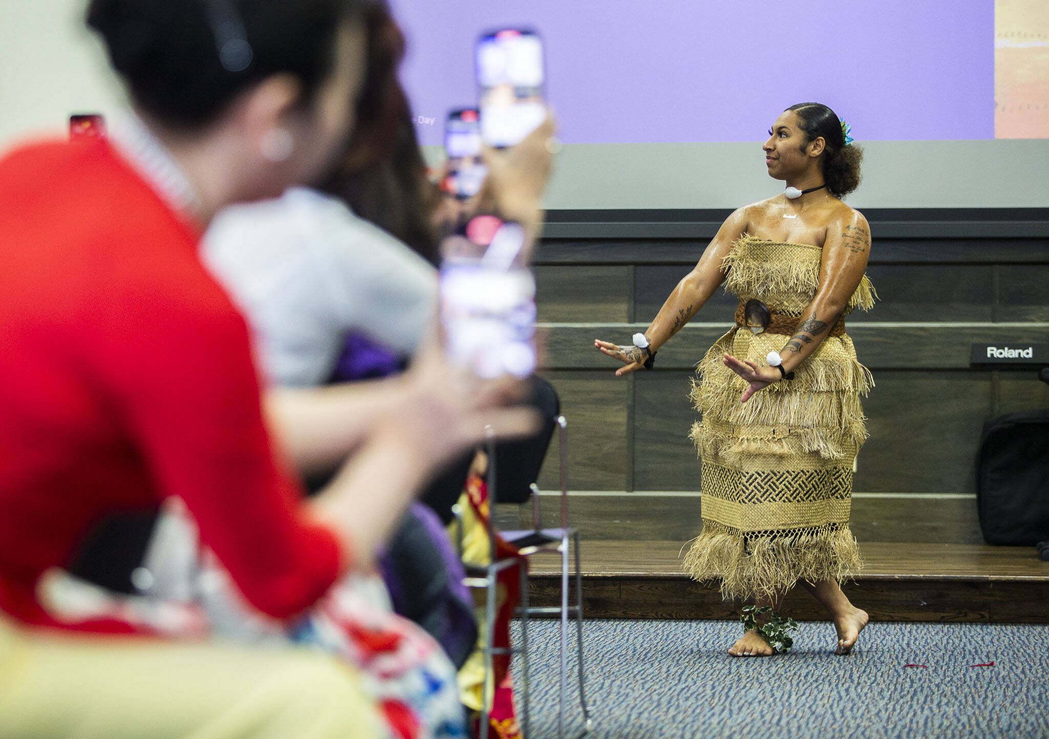 Destinee Harris performs while representing the islands of Fiji and Tonga during World Refugee Day at Everett Community College on Tuesday, June 20, 2023 in Everett, Washington. (Olivia Vanni / The Herald)