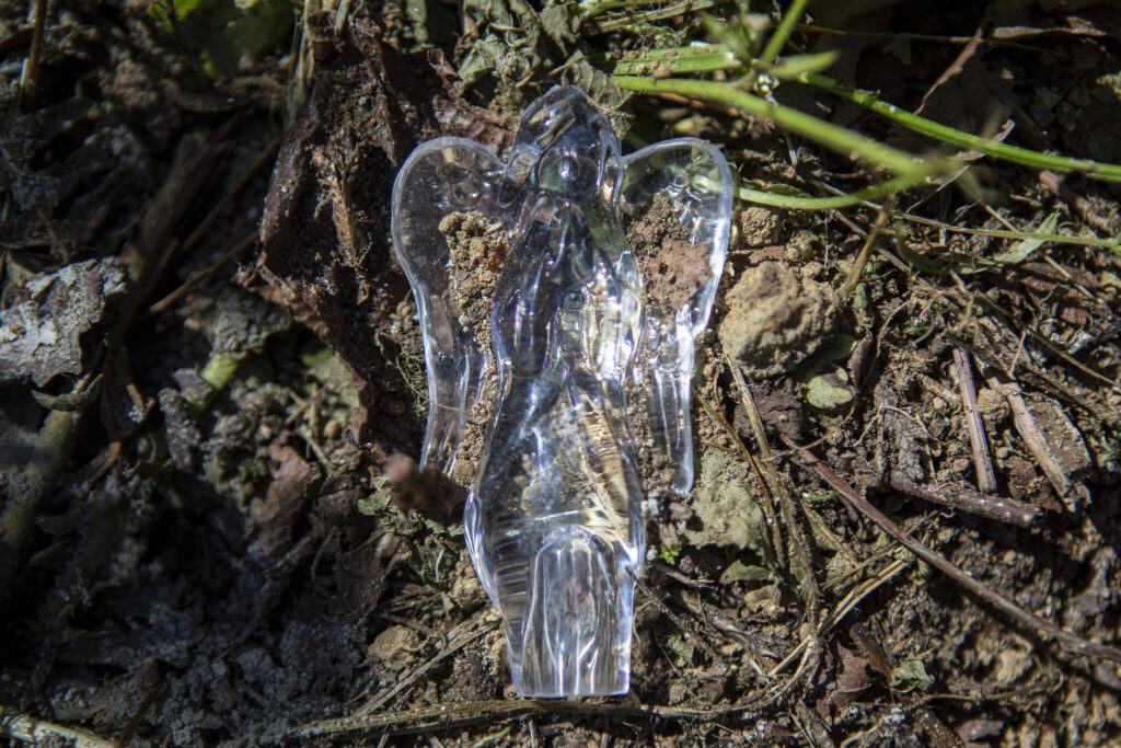 An angel from a memorial for a car crash involving the death of Szander Pouv near the corners of 215th Avenue SE and 108th Street SE north of Monroe, Washington on Thursday, June 29, 2023. (Annie Barker / The Herald)
