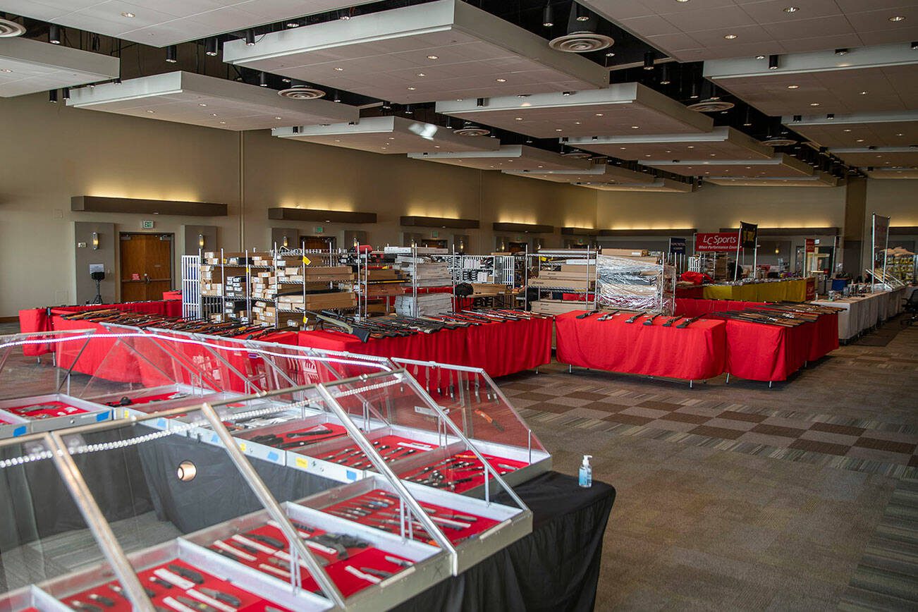 Inside the gun, ammo and knife show at Angel of the Winds Arena ballroom on Saturday, April 29, 2023 in Everett, Washington. (Olivia Vanni / The Herald)