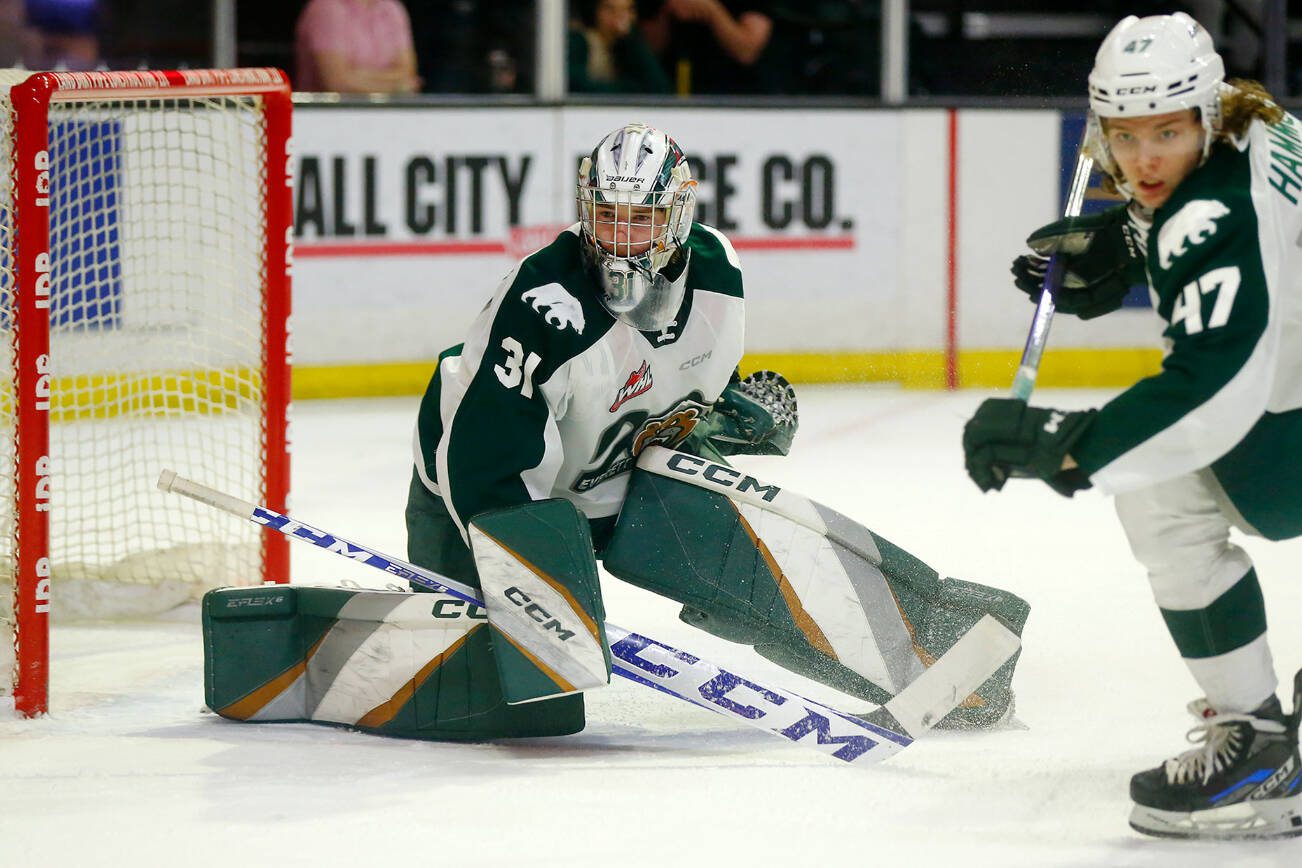 Everett Silvertips goalie Tyler Palmer slides to the near post while watching a play unfold during game three of a playoff series against the Portland Winterhawks on Monday, April 3, 2023, at Angel of the Winds Arena in Everett, Washington. (Ryan Berry / The Herald)