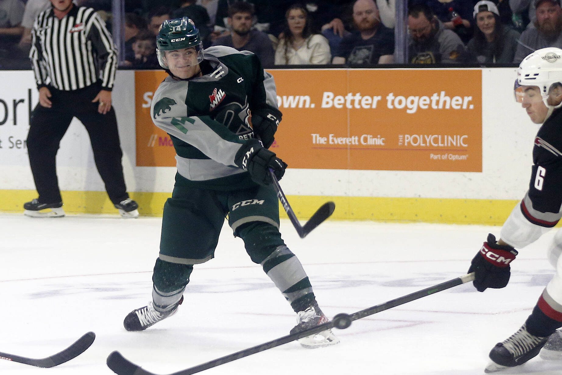 Everett Silvertips’ Austin Roest wrists a shot to the goal during the season opener against the Vancouver Giants on Saturday, Sep. 24, 2022, at Angel of the Winds Arena in Everett, Washington. (Ryan Berry / The Herald)