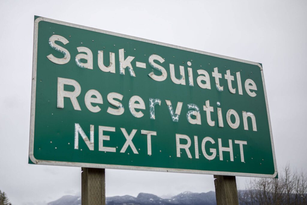 A sign near the Sauk-Suiattle Reservation in Darrington, Washington, on Thursday, March 23, 2023. (Annie Barker / The Herald)
