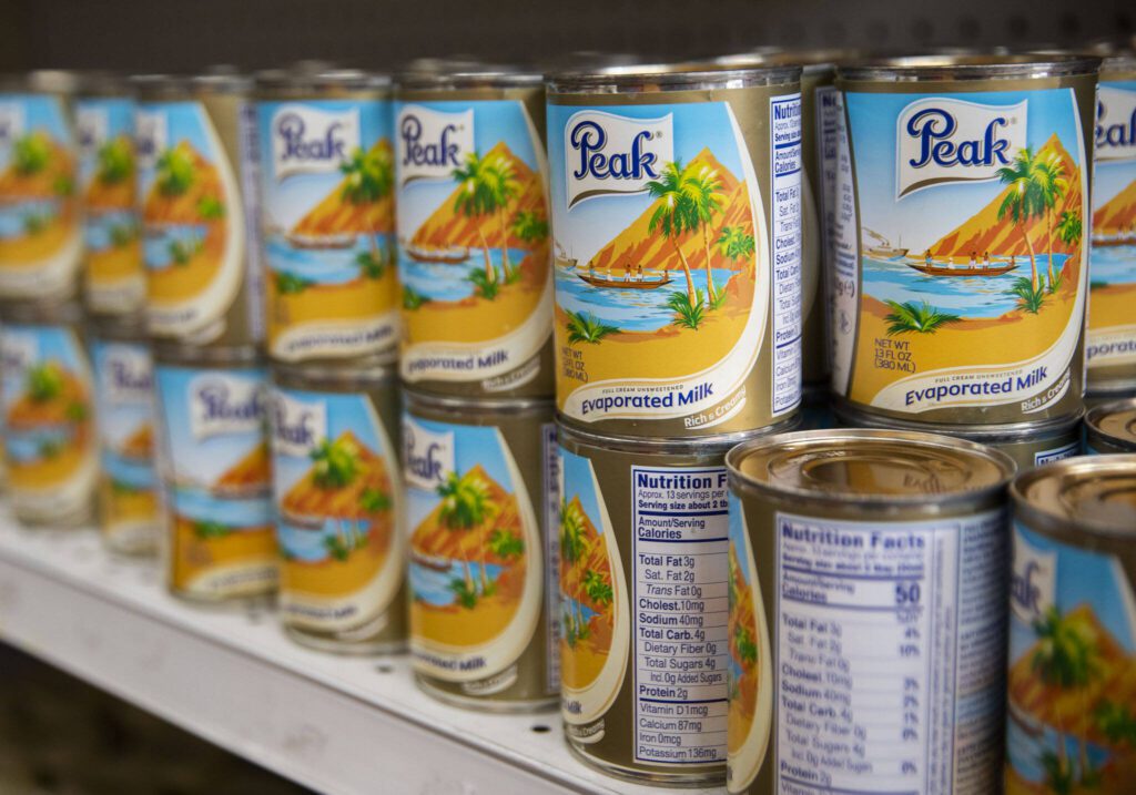 Peak evaporated milk, a popular African brand, available at Dizayus African Market on Wednesday, June 21, 2023 in Everett, Washington. (Olivia Vanni / The Herald)
