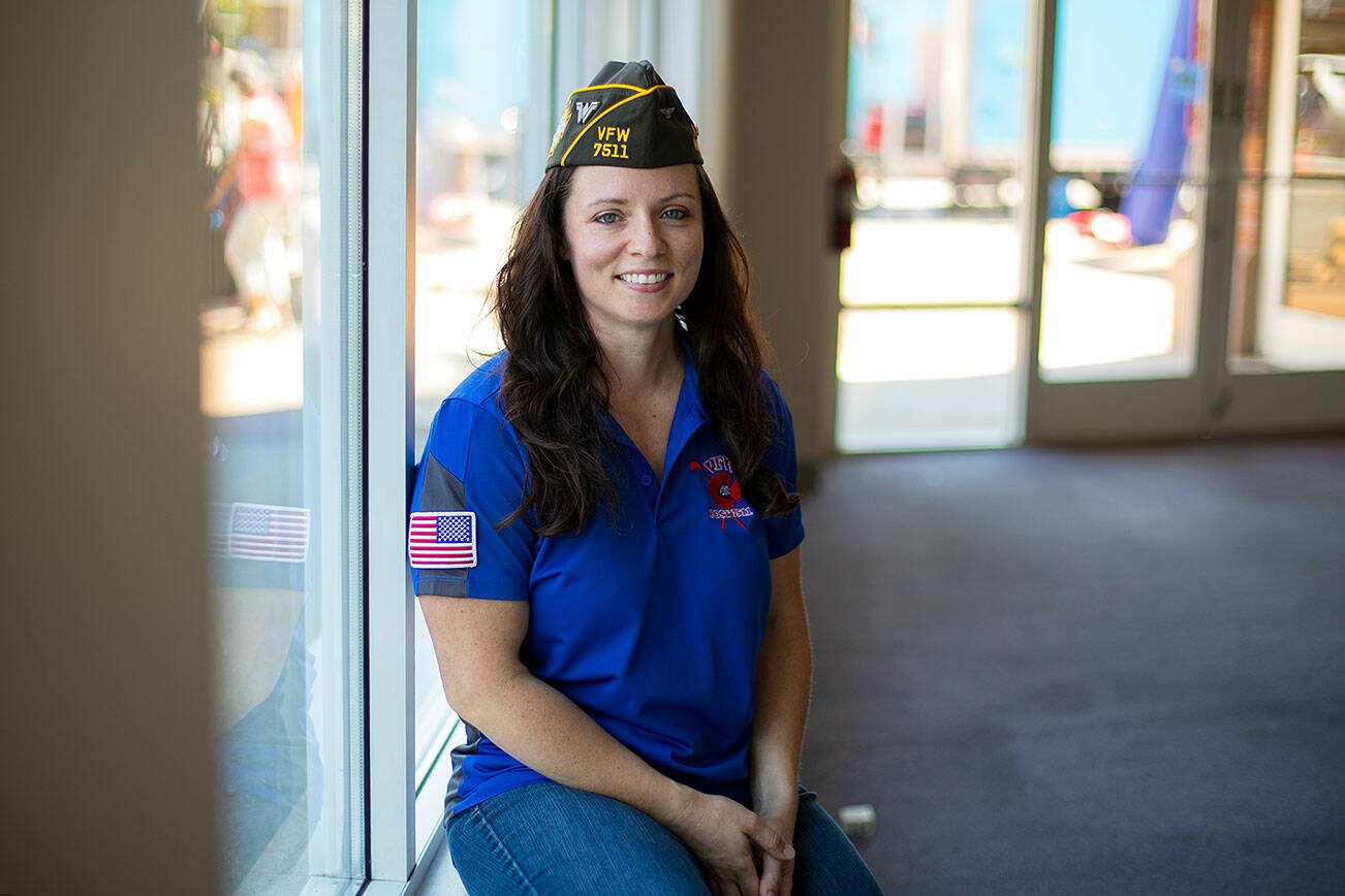 Casi Myers, the new Post Commander at VFW Post 7511, sits inside the post’s new home along Main Street on Friday, June 23, 2023, in Monroe, Washington. Myers, a native of Arlington, served in the Navy from 2004 to 2009 as an electronics technician on reconnaissance aircraft. (Ryan Berry / The Herald)