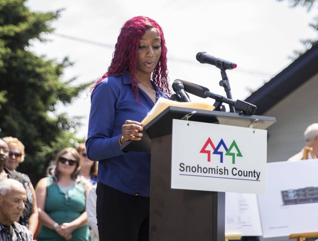 Former Rise Up Academy students Mariame Toure speaks about her time at the school and how it helped her late on in life during an event announcing funding for affordable child care slots held at Rise Up Academy on Thursday, July 6, 2023 in Everett, Washington. (Olivia Vanni / The Herald)
