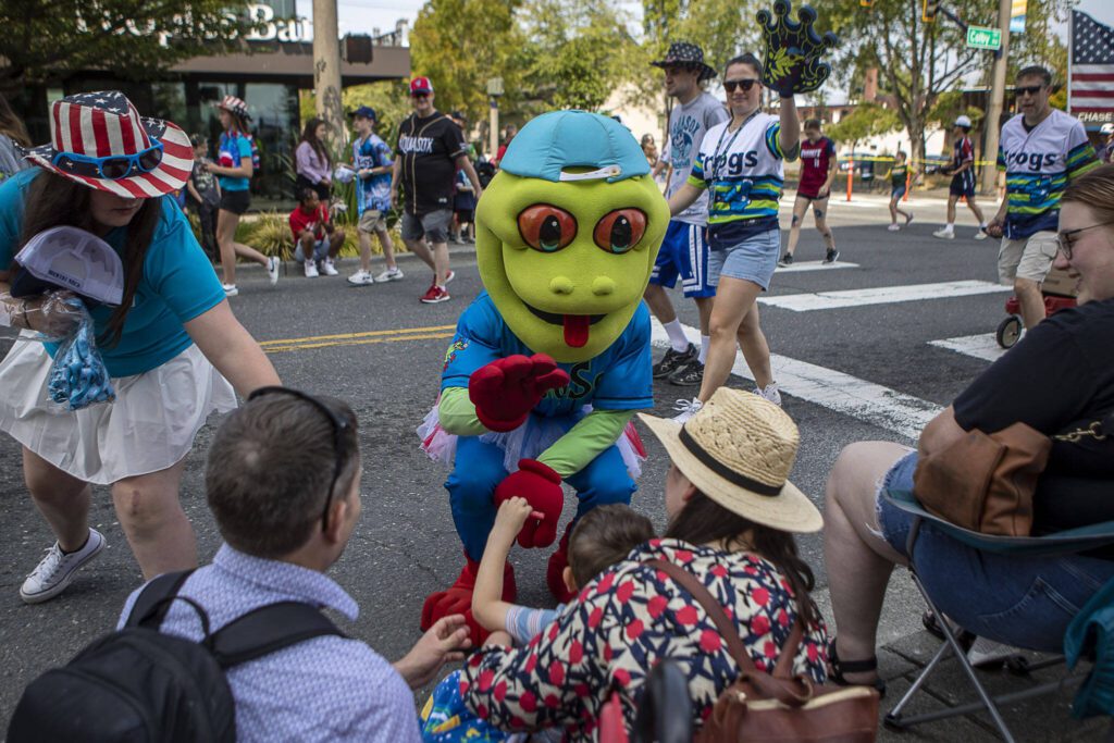 AquaSox Mascot Webbly greets parade watchers during the Everett 4th of July parade in downtown Everett, Washington on Tuesday, July 4, 2023. (Annie Barker / The Herald)
