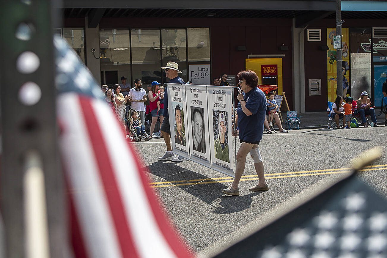 Fallen soldiers are remembered during the Fourth of July parade in downtown Everett, Washington, on Tuesday, July 4, 2023. (Annie Barker / The Herald)
