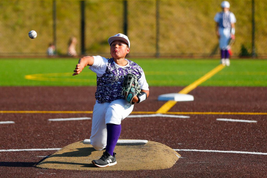 Lake Stevens All Star Jo Jo Valdez pitches in relief against Everett during a 12u Little League matchup on Wednesday, July 5, 2023, at the Phil Johnson Ballfields in Everett, Washington. (Ryan Berry / The Herald)
