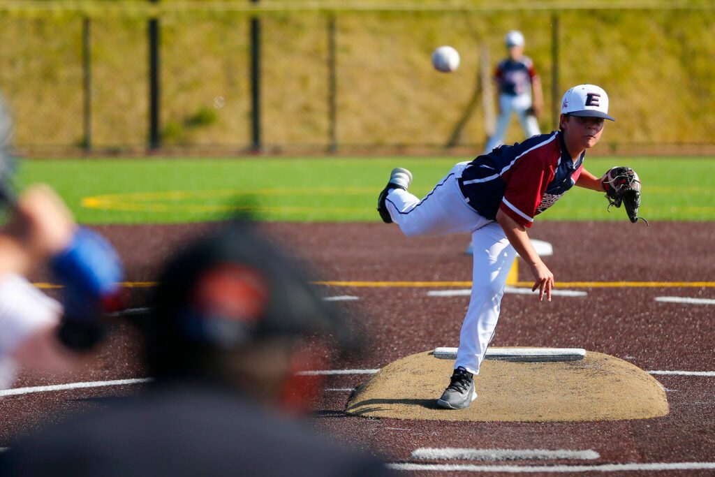 Everett All Star Evan Brunni delivers from the mound against Lake Stevens during a 12u Little League matchup on Wednesday, July 5, 2023, at the Phil Johnson Ballfields in Everett, Washington. (Ryan Berry / The Herald)
