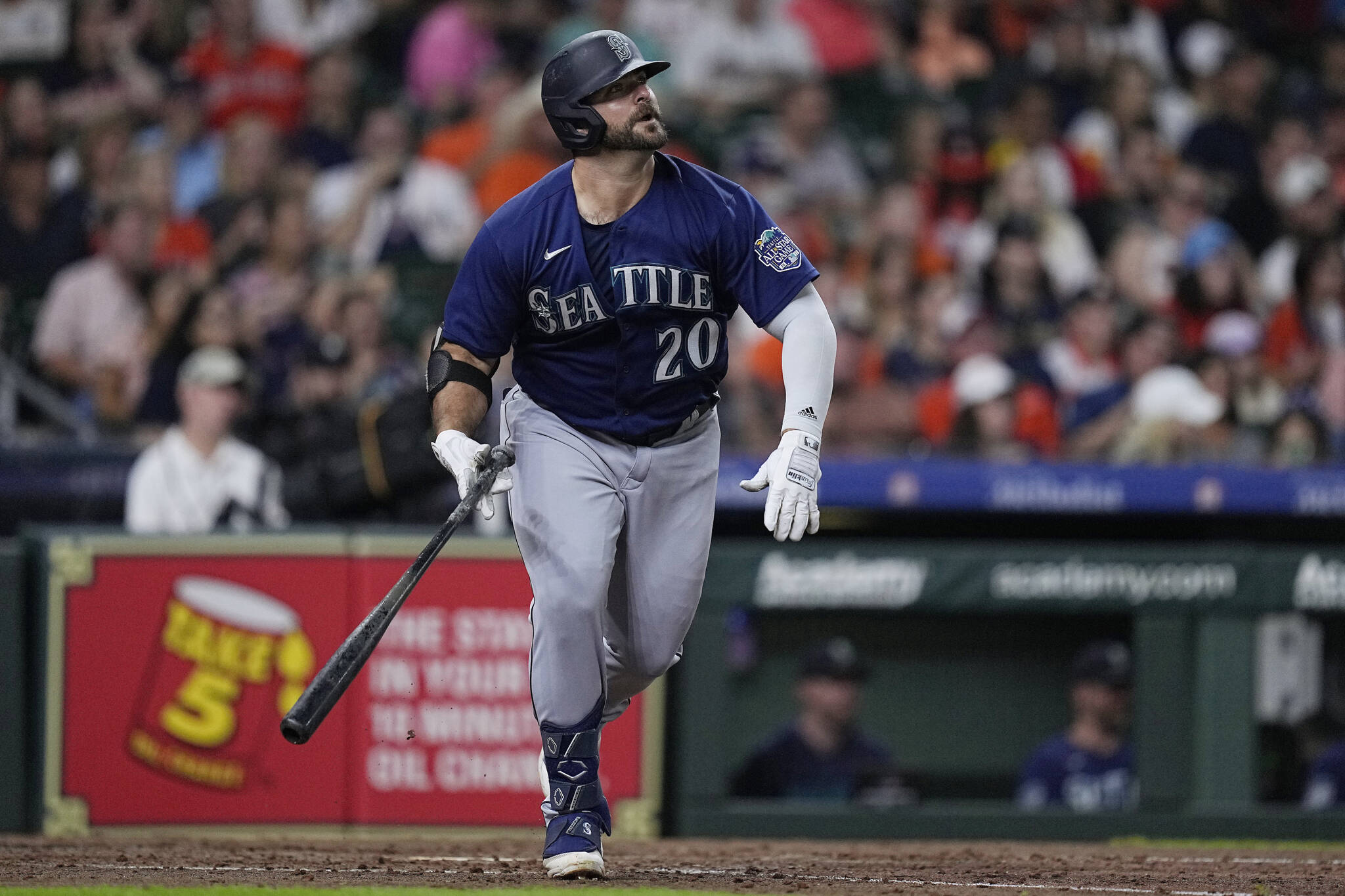 The Mariners’ Mike Ford watches his three-run double during the fourth inning of a game against the Astros on Friday in Houston. (AP Photo/Kevin M. Cox)