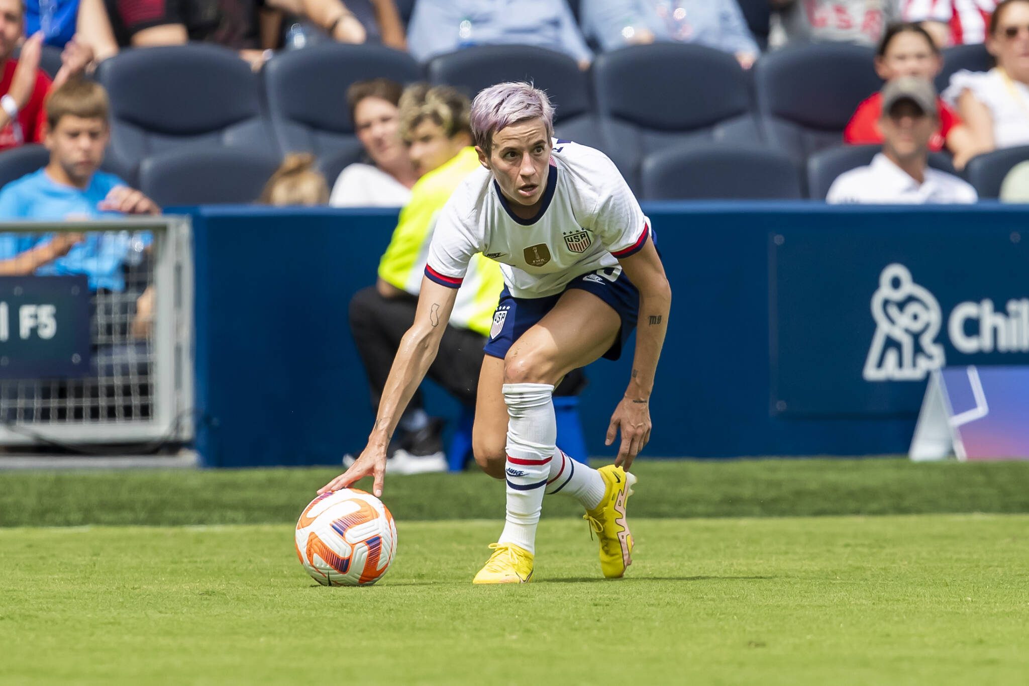 United States forward Megan Rapinoe resets the ball during an international friendly against Nigeria on Sept. 3, 2022, in Kansas City, Kan. (AP Photo/Nick Tre. Smith)