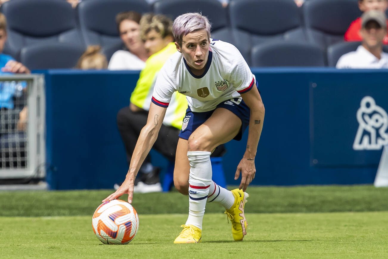 FILE - United States forward Megan Rapinoe (15) resets the ball during an international friendly soccer match against Nigeria Saturday, Sept. 3, 2022, in Kansas City, Kan. Days before heading to her fourth World Cup, Rapinoe announced she’ll retire at the end of the National Women's Soccer League season. Rapinoe, 38, made the announcement on Twitter Saturday, July 8, 2023. (AP Photo/Nick Tre. Smith, File)