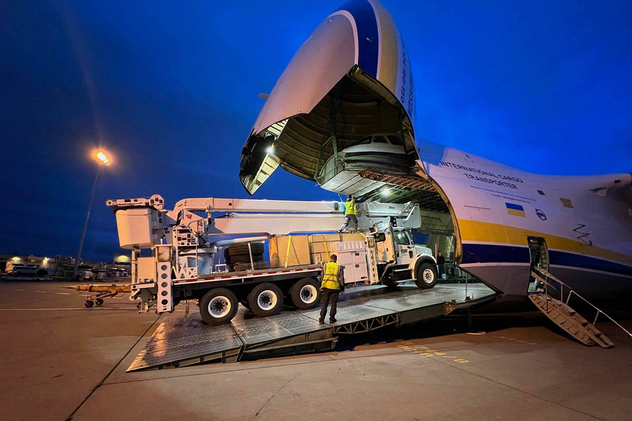 Power restoration equipment, bound for Guam, is loaded onto a massive cargo plane at Seattle-Tacoma International Airport on June 13, 2023 in Seattle, Washington. (Photo provided by Snohomish County PUD)