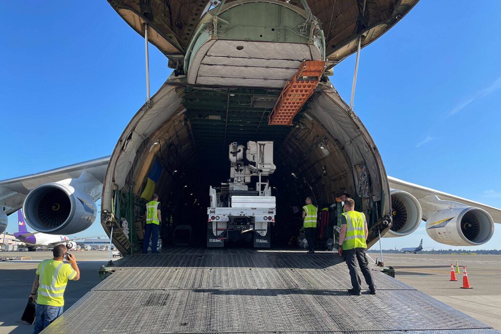 Two Snohomish County PUD bucket trucks and a mechanics truck were shipped to Guam on June 13, 2023 to help the U.S. Territory recover power after a massive typhoon. (Photo provided by Snohomish County PUD)
