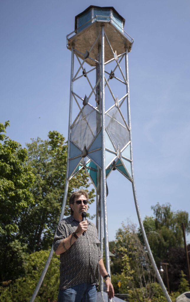 Joe Powers, the artist who created the Lake Stevens Water Tower art piece, speaks during the ribbon-cutting ceremony on Thursday, July 20, 2023 in Lake Stevens, Washington. (Olivia Vanni / The Herald)
