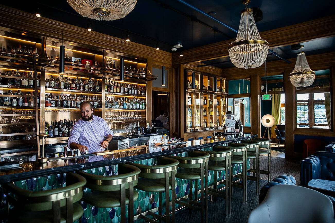 Inside of the the Muse Whiskey Bar side of the 100-year-old Weyerhaeuser building on Wednesday, July 12, 2023 in Everett, Washington. (Olivia Vanni / The Herald)