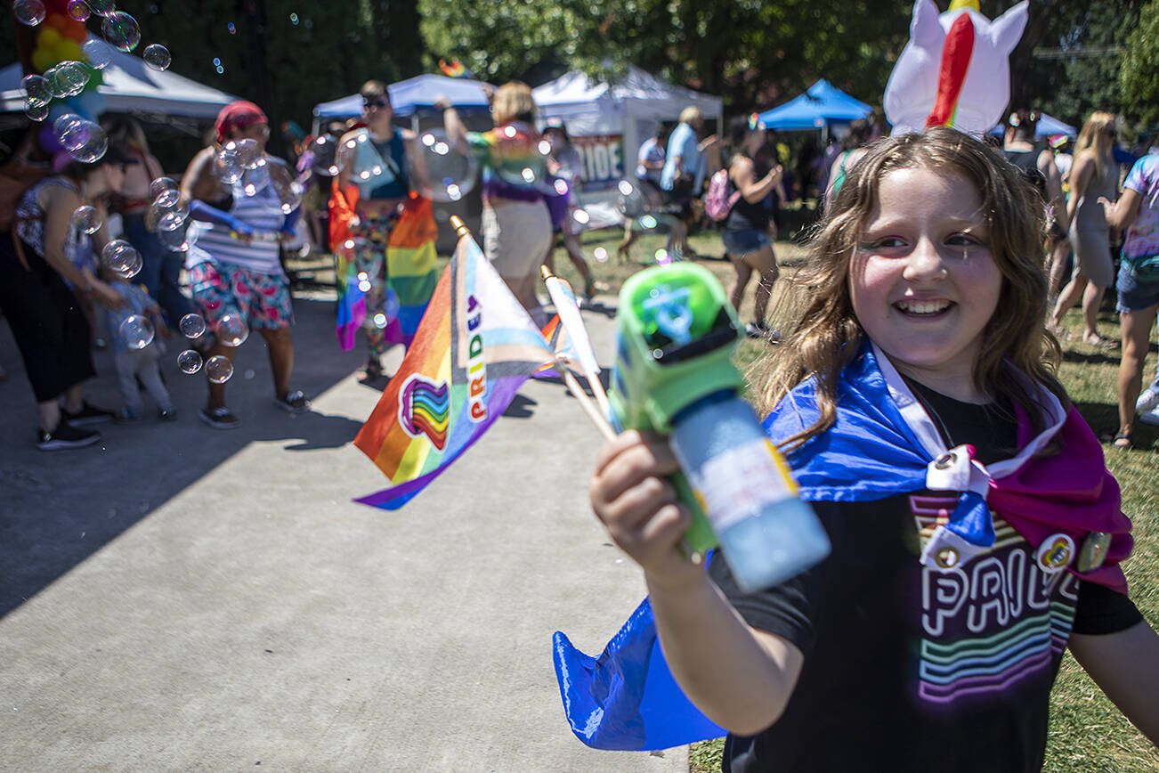 Arlington Pride event draws hundreds, protesters also show