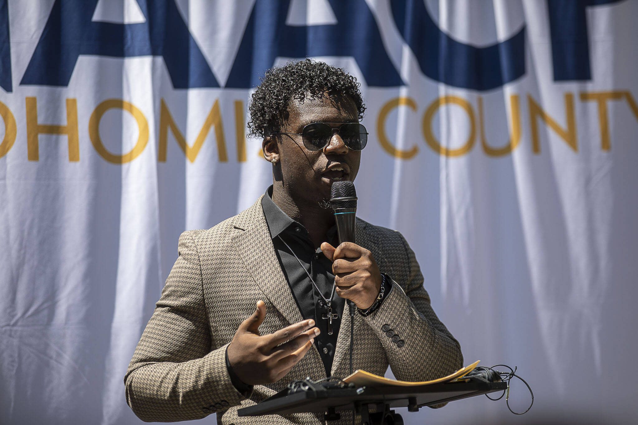 Lynnwood City Councilmember Joshua Binda speaks during a NAACP Snohomish County press conference at Lynnwood City Hall in Lynnwood, Washington on Thursday, July 20, 2023. (Annie Barker / The Herald)