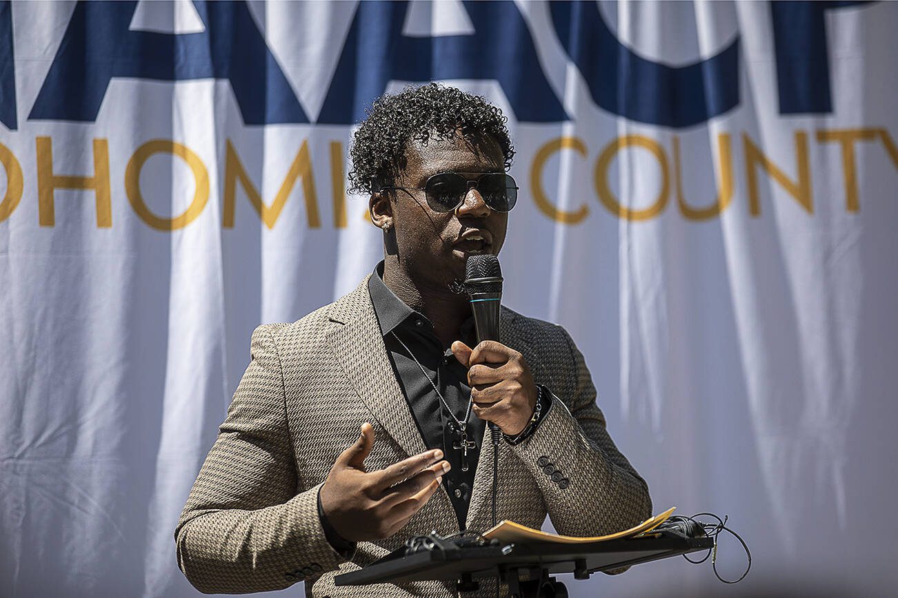 Lynnwood City Councilmember Joshua Binda speaks during a NAACP Snohomish County press conference at Lynnwood City Hall in Lynnwood, Washington on Thursday, July 20, 2023. (Annie Barker / The Herald)